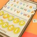 Tablica manipulacyjna sensoryczna montessori walizka dinozaury